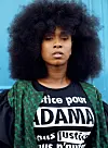French Black Lives Matter activist Assa Traoré with an Afro and a 'justice pour Adama' t-shirt.