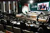 A wide-range photograph of African leaders and dignitaries seated at a summit, as Egyptian President and former African Union Chairman Abdel Fattah al-Sisi delivers a speech on a podium.